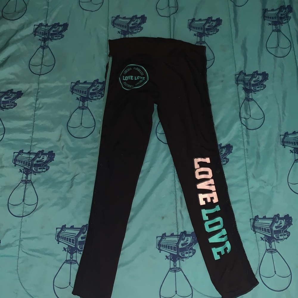 Silky black and blue love pants with mesh on bottom pants legs